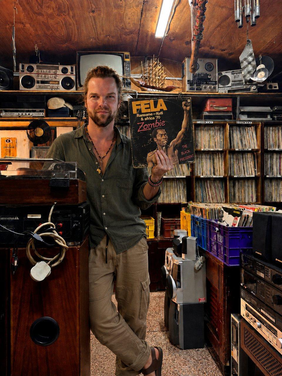 Portrait of the artist at The Real Vinyl Guru, Nairobi, 2025.